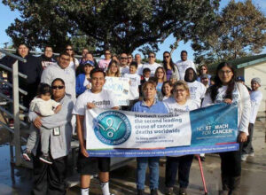 group holding banner