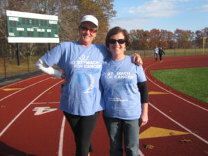 Two people wearing walk shirts